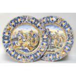 A Pair of Italian Maiolica Chargers, 19th century, in Urbino style, painted with Classical and