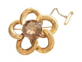 A 9 Carat Gold Smoky Quartz Brooch, the round cut smoky quartz in a yellow claw setting, to an