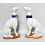 A Pair of 20th Century Staffordshire Seated Hounds, 35cm high
