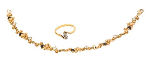 A 9 Carat Gold Gem-Set Bracelet, length 19.5cm; and A Diamond Two Stone Twist Ring, stamped '