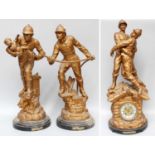 An Early 20th Century French Spelter Clock Garniture, depicting firemen in heroic poses after