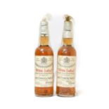 Dewar's White Label Finest Scotch Whisky of Great Age, spring cap bottling, by appointment to Her