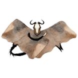 Horns/Hides: A Set of Western White-bearded Wildebeest Horns, Flank Skins & Fly Swat, circa 21st