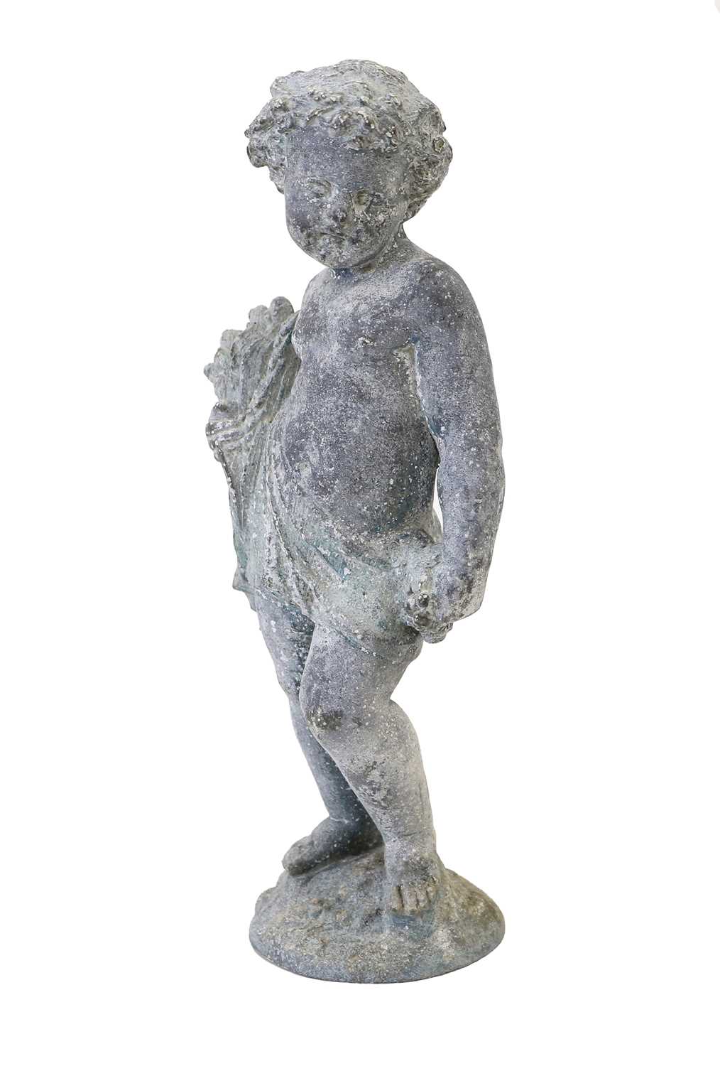 A Lead Figure of Summer from The Seasons, in 18th century style, as a loosely draped putto holding a