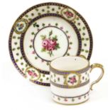 A Sèvres Coffee Can and Saucer, 1779-86, later decorated in polychrome enamels with flower sprigs