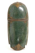 A Brass-Mounted Shagreen Glasses Case, 19th century, of oval form with strapwork mounts 16.5cm long