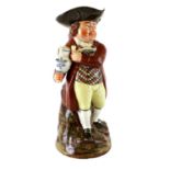 A Walton Pearlware Hearty Goodfellow Toby Jug, early 19th century, modelled with a pipe and