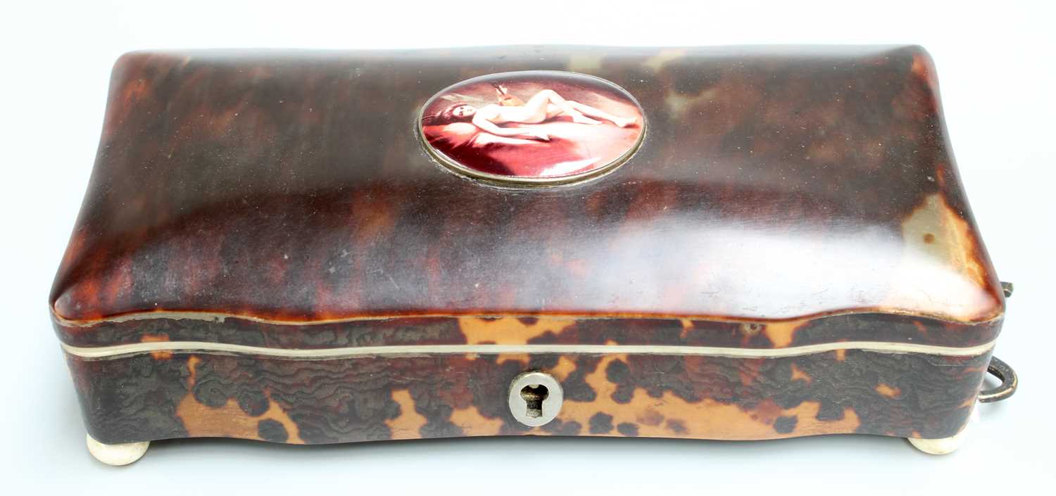 A Tortoiseshell and Bone Dressing Table Box, early 20th century, of shaped rectangular form, the