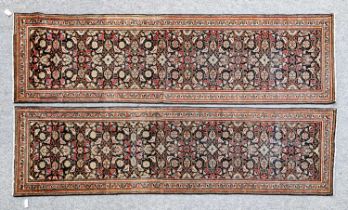 Pair of Feraghan Runners West Iran, circa 1910 With a midnight blue Herati field enclosed by