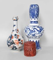 A Chinese Porcelain Guglet, Qianlong, painted in the Imari style with peonies and chrysanthemum 24cm