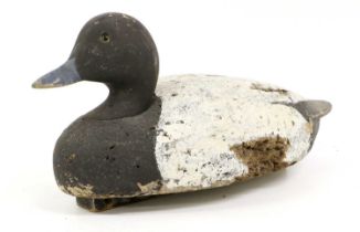 A Carved and Painted Decoy Duck, probably American, early 20th century, naturalistically carved