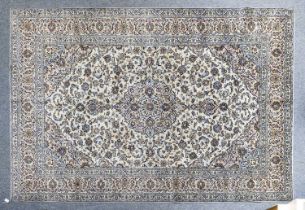 Kashan Carpet Central Iran, circa 1970 The cream field of palmettes and vines centred by pale