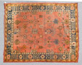 Ushak Carpet Central West Turkey, circa 1900 The coral pink field witha diamond lattice containing