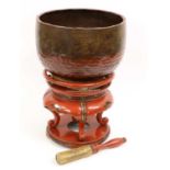 A Japanese Copper Alloy Temple Gong or Singing Bowl, 19th century, of semi-ovoid form, decorated