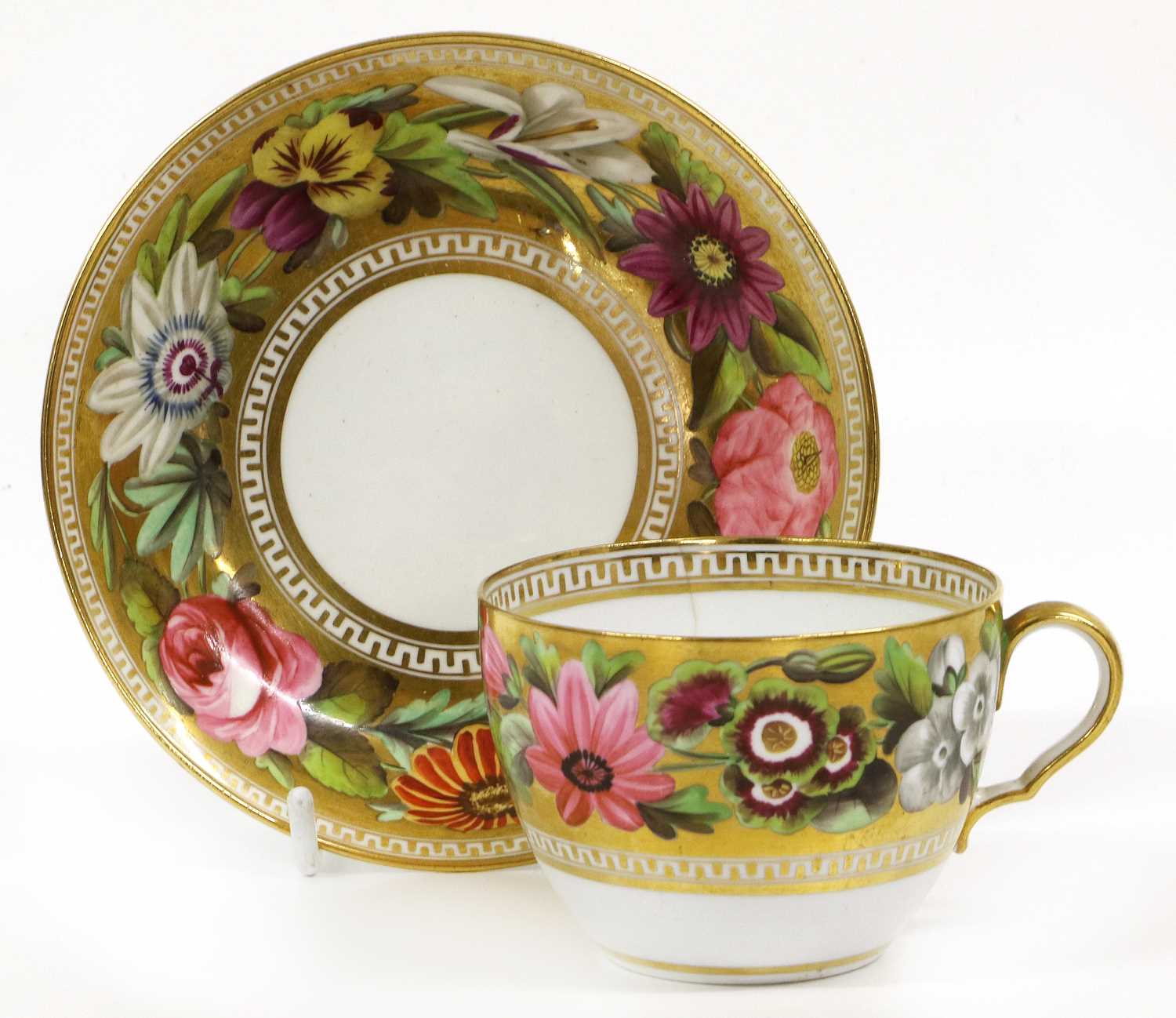 A Spode Teacup and Saucer, circa 1810, of bute shape, gilt ground and painted with large flowers - Image 4 of 5