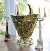 A Dutch Brass Coal Bucket, in Renaissance style, of oval form with leaf cast overhead handle over
