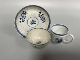 A Christian's Liverpool Porcelain Teabowl and Saucer, circa 1770, with a strap flute and floral