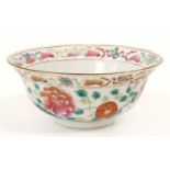 A Chinese Porcelain Bowl, Guangxu, painted in famille rose enamels with a phoenix in a continuing