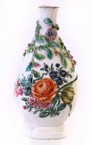 A London Decorated Chinese Porcelain Bottle Vase, 18th century, of quatrefoil form, applied with