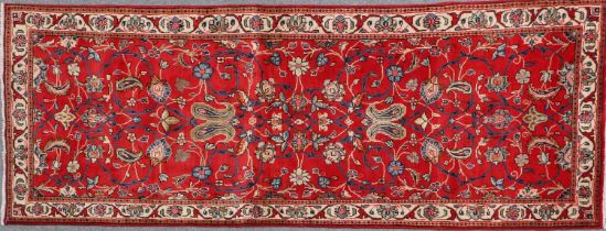 Sarouk Gallery Rug West Iran, circa 1950 The abrashed blood red field with large scrolling vines,