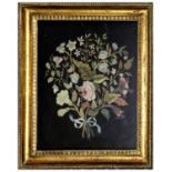 A Regency Curled Paper Picture, modelled as a vase of flowers on a demi-lune bracket 32cm by 24cm,