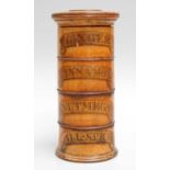 A Treen Four-Section Spice Tower, mid 19th century, of cylindrical form appllied with labels for