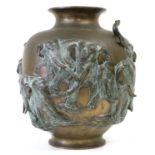 A Japanese Bronze Vase, Meiji period, of ovoid form with flared neck, cast in relief with a herd