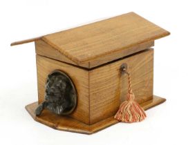 A French Bronze-Mounted Walnut Novelty Tea Caddy in the form of a Dog Kennel, circa 1900, the hinged