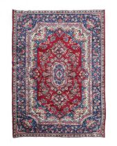 Kirman Carpet South East Iran, circa 1960 The blood red field of semi-naturalistic flowering