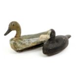 A Decoy Duck, early 20th century, naturalistically carved and painted with green plumage, 37cm