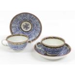 A Pair of Worcester Porcelain Breakfast Cups and Saucers, circa 1775, painted in underglaze blue,