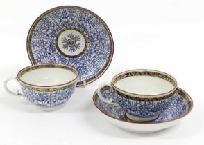 A Pair of Worcester Porcelain Breakfast Cups and Saucers, circa 1775, painted in underglaze blue,