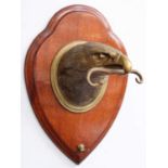 A Victorian Cast Brass Dinner Gong, by William Tonks & Sons, modelled as the head of an eagle with a