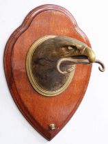 A Victorian Cast Brass Dinner Gong, by William Tonks & Sons, modelled as the head of an eagle with a