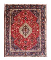 Tabriz Carpet North West Iran, circa 1960 The scarlet field of semi-naturalistic flowering plants