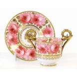 A Davenport Porcelain Twin Handled Cup on Stand, 19th century, painted with pink roses within gilt