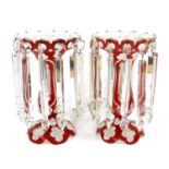 A Pair of White and Red Overlay Clear Glass Lustres, circa 1860, the castellated bowls hung with