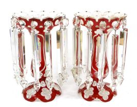 A Pair of White and Red Overlay Clear Glass Lustres, circa 1860, the castellated bowls hung with