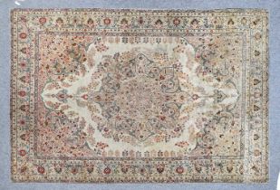 Iranian Carpet Possibly Tabriz, circa 1900 The cream field with a central flowerhead medallion