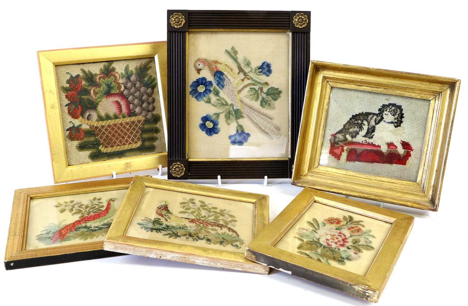 A Pair of Victorian Woolwork Pictures, depicting exotic birds amongst foliage 14cm by 16.5cm A