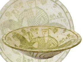 An Islamic Pottery Bowl, probably Nishapur, 10th/11th century, painted in yellow and brown with a