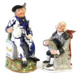 A Pearlware American Sailor Toby Jug, circa 1820, modelled seated upon a sea chest inscribed "