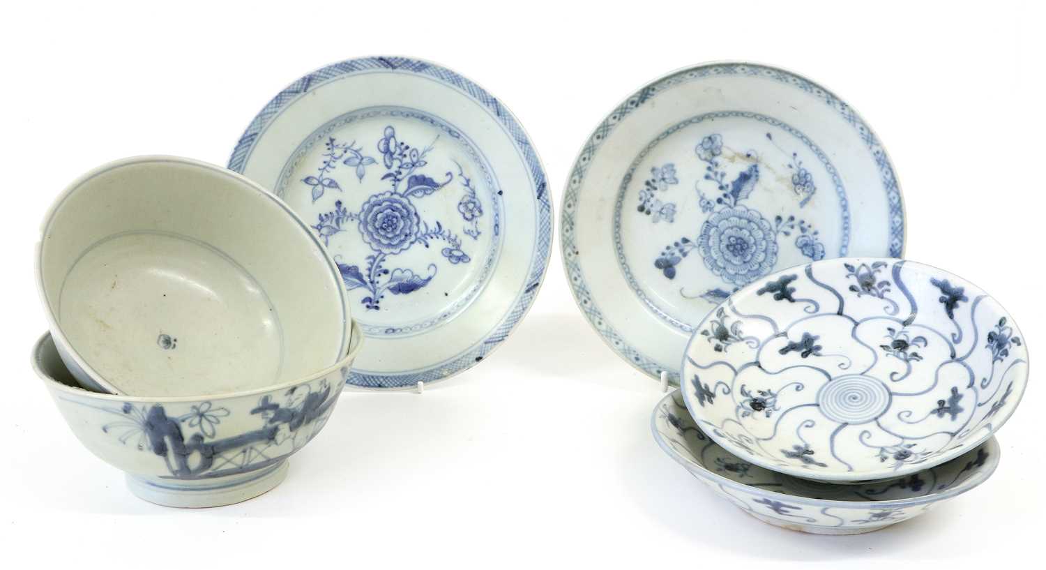 Two Chinese Porcelain "Tek Sing" Bowls, each painted in underglaze blue with a boy in a landscape