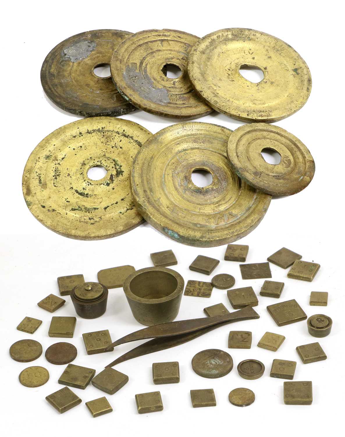 A Collection of Various Brass Apothocary and Other Weights, including British and Turkish examples