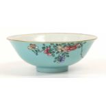 A Chinese Porcelain Bowl, Qing Dynasty, turquoise ground with sgraffito scrollwork feathers, painted