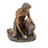 A Bronze Figure of a Kneeling Youth, holding a dish, his dog at his side, on a mound base 93cm high