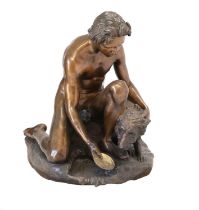 A Bronze Figure of a Kneeling Youth, holding a dish, his dog at his side, on a mound base 93cm high