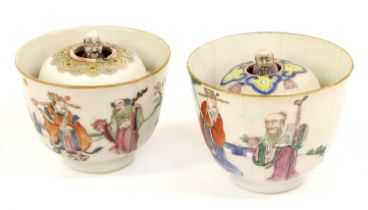 A Chinese Porcelain Surprise Cup, Tongzhi, painted in famille rose enamels with figures in a