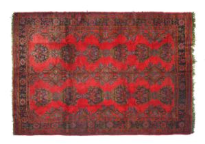 Ushak Carpet Central/West Anatolia, circa 1910 The scarlet field with columns of stylised