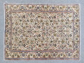 Tabriz Carpet North West Iran, circa 1940 The ivory field with an allover design of birds, flowers